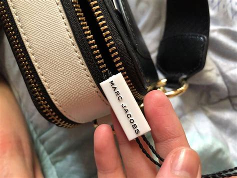 how to spot a fake marc jacobs bag|marc jacobs knock off bags.